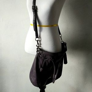 Coach purple cross body medium bucket bag.